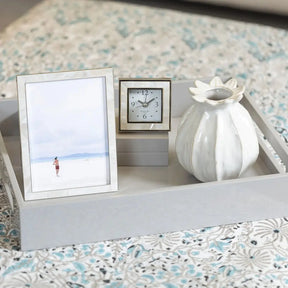 Addison Ross White Pave Mother of Pearl Frame in Cream on a tray on a table