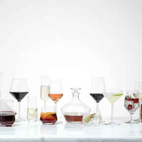 Fortessa Tritan Pure Cabernet Glass with various items in the collection
