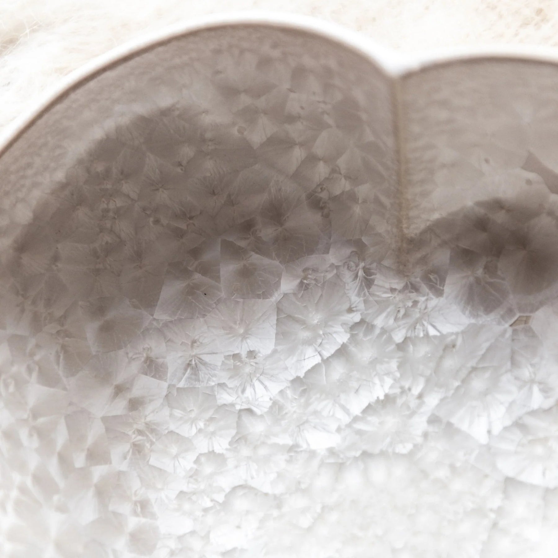 An image of Simon Pearce Crystalline Twist Heart Bowl