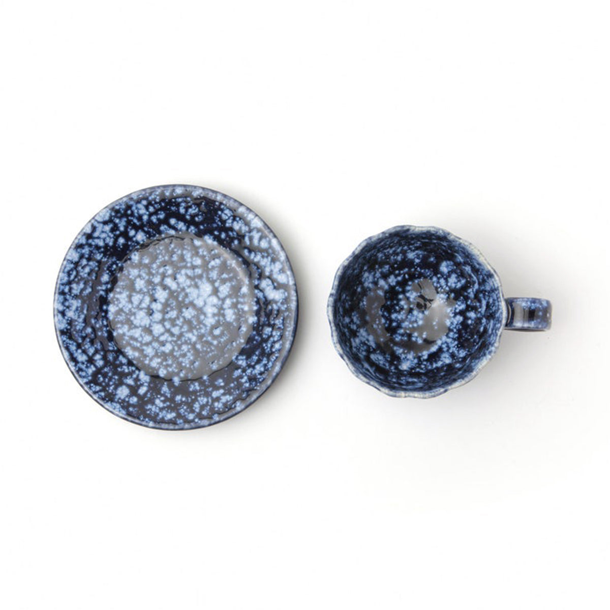 An image of Blue Pheasant Isla Spotted White Navy Cup and Saucer- Pack of 4