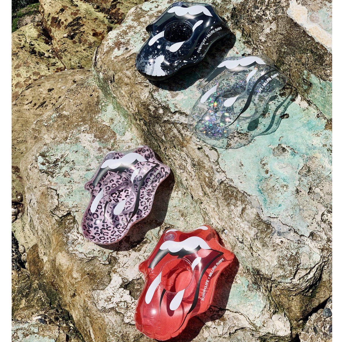 An image of Sunnylife Inflatable Drink Holders Rolling Stones Lips - Set of 4