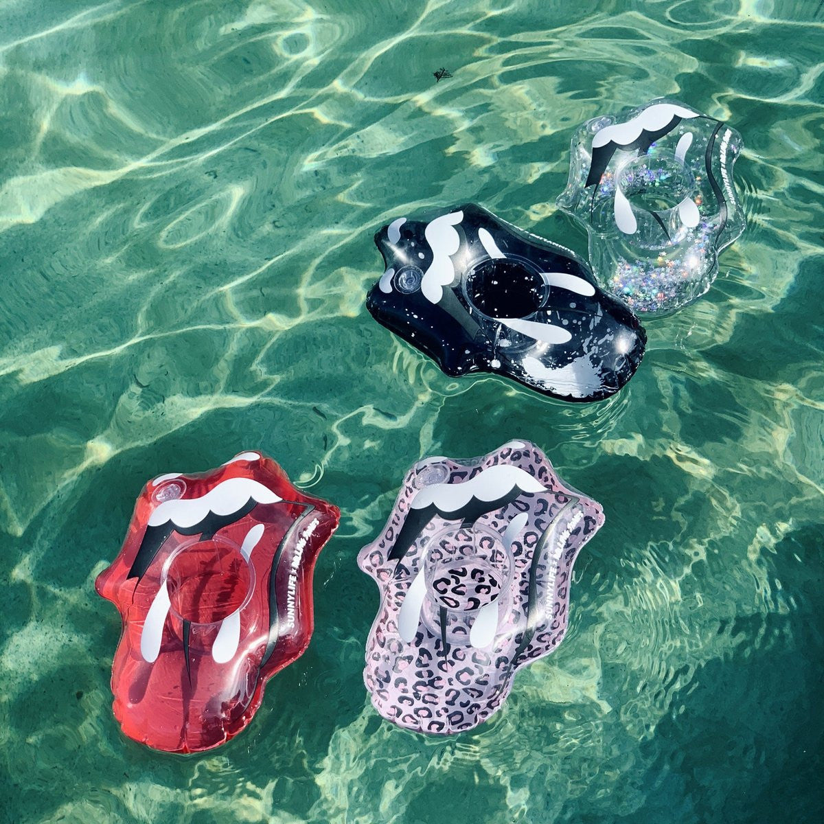 An image of Sunnylife Inflatable Drink Holders Rolling Stones Lips - Set of 4