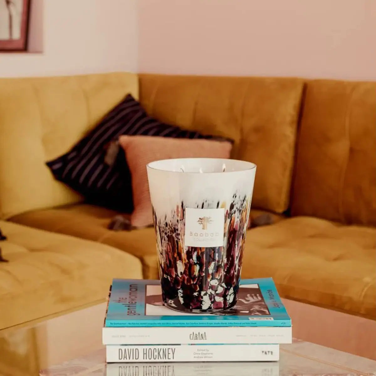 Baobab Collection Max 24 Rainfoest Tanjung Candle set on a coffee table and books in a room