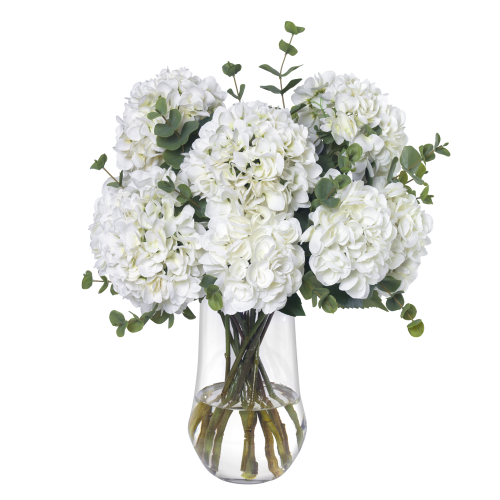 An image of Diane James Large white hydrangea and eucalyptus bouquet in glass vase