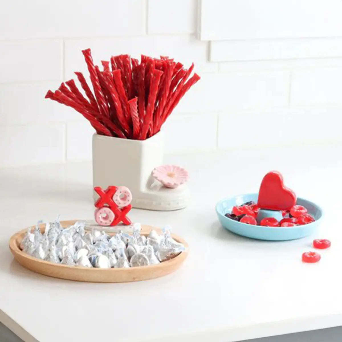 Nora Fleming Be Mine Red Heart Mini with chocolates on the table
