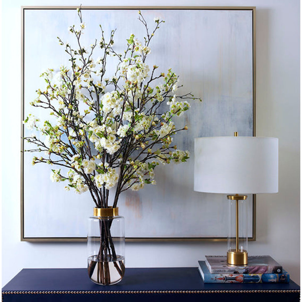 An image of Diane James Mixed blossom branches in tall vase with gold band -36" x 48"