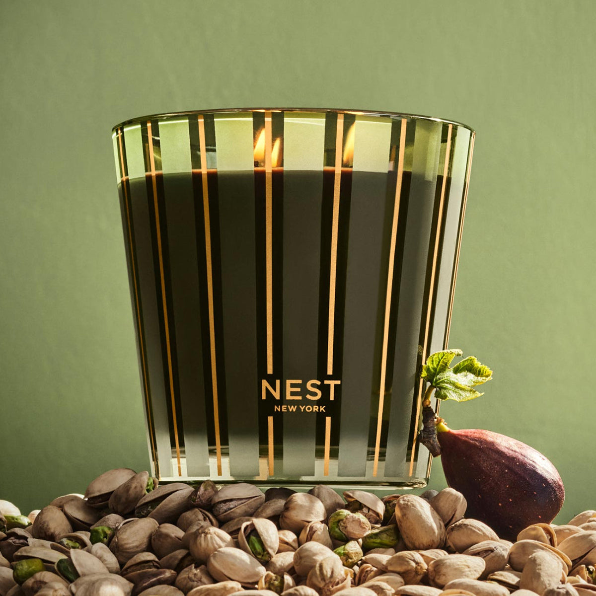 An image of Nest Fragrances Pistachio & Wild Fig 3-Wick Candle 21.2 oz