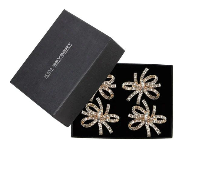 An image of Kim Seybert Jeweled Bow Napkin Ring - Set of 4