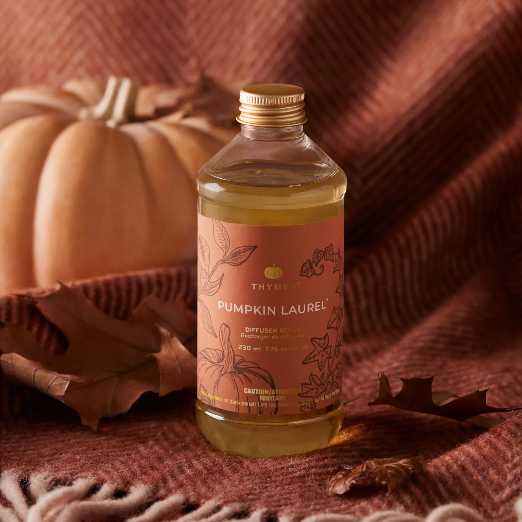 An image of Thymes Pumpkin Laurel Reed Diffuser Oil Refill 7.75 oz