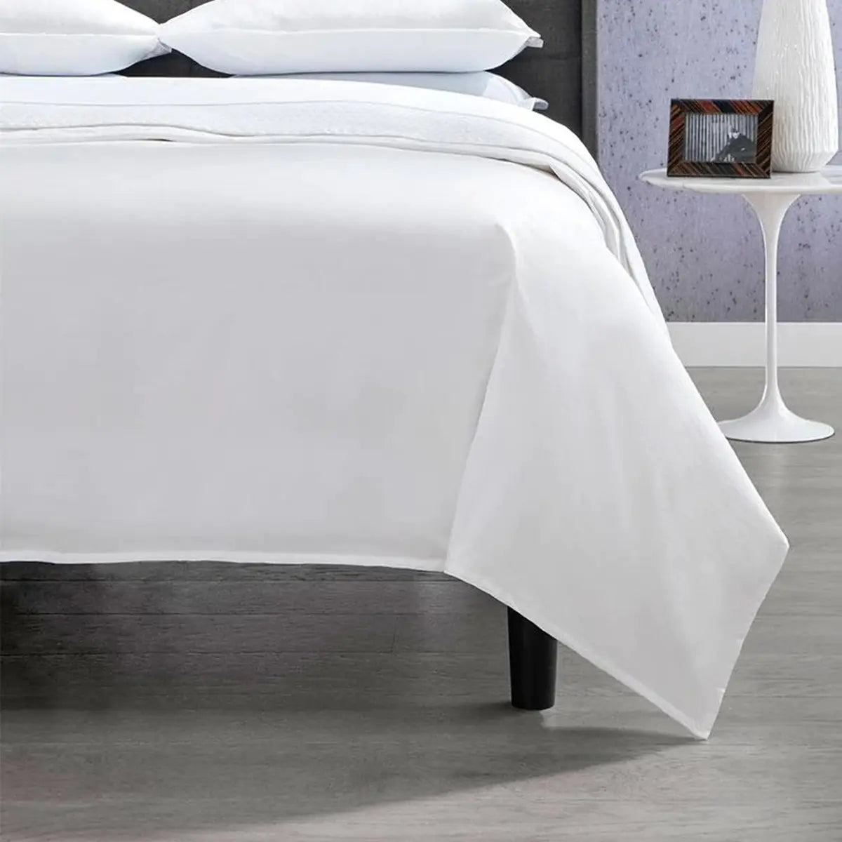 Sferra Corto Celeste Duvet Cover on a bed