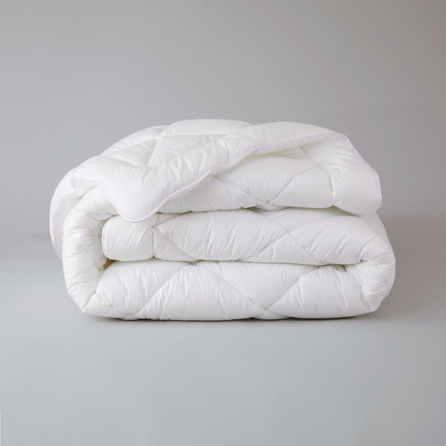Image of a folded Yves Delorme Actuel White Comforter