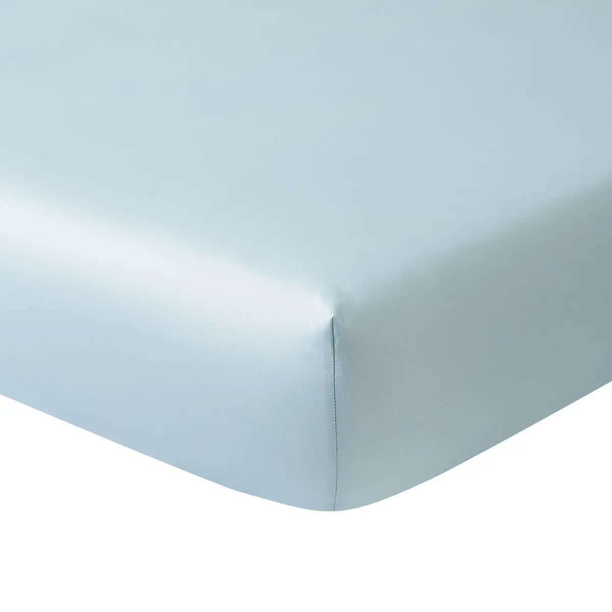 Yves Delorme Triomphe Fitted Sheet in Horizon on a bed