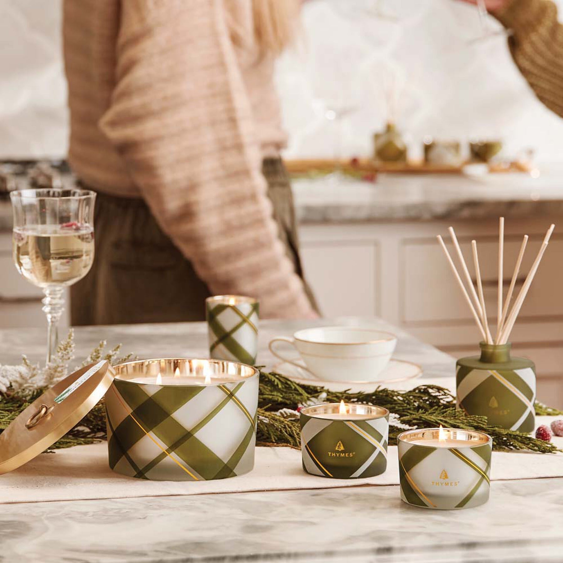 An image of Thymes Fraiser Fir Frosted Plaid Petite Reed Diffuser 4 fl oz