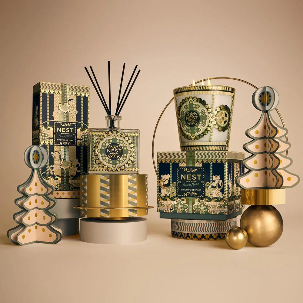 Image of Nest Holiday Fragrances stacked up on display