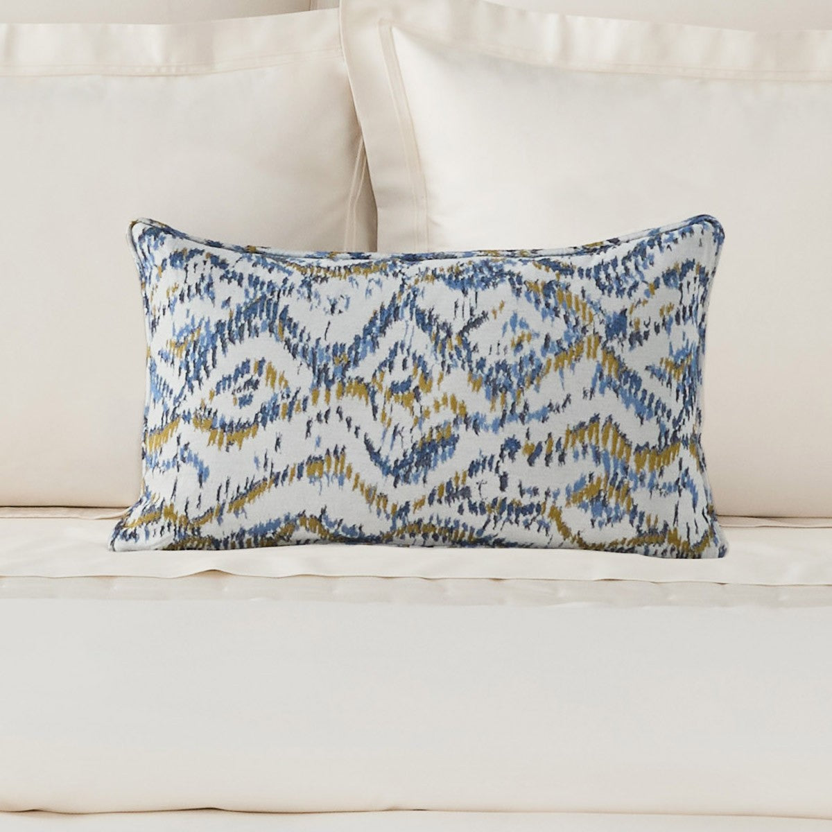 An image of Yves Delorme Ecumes Decorative Pillow  - 13" x 22"