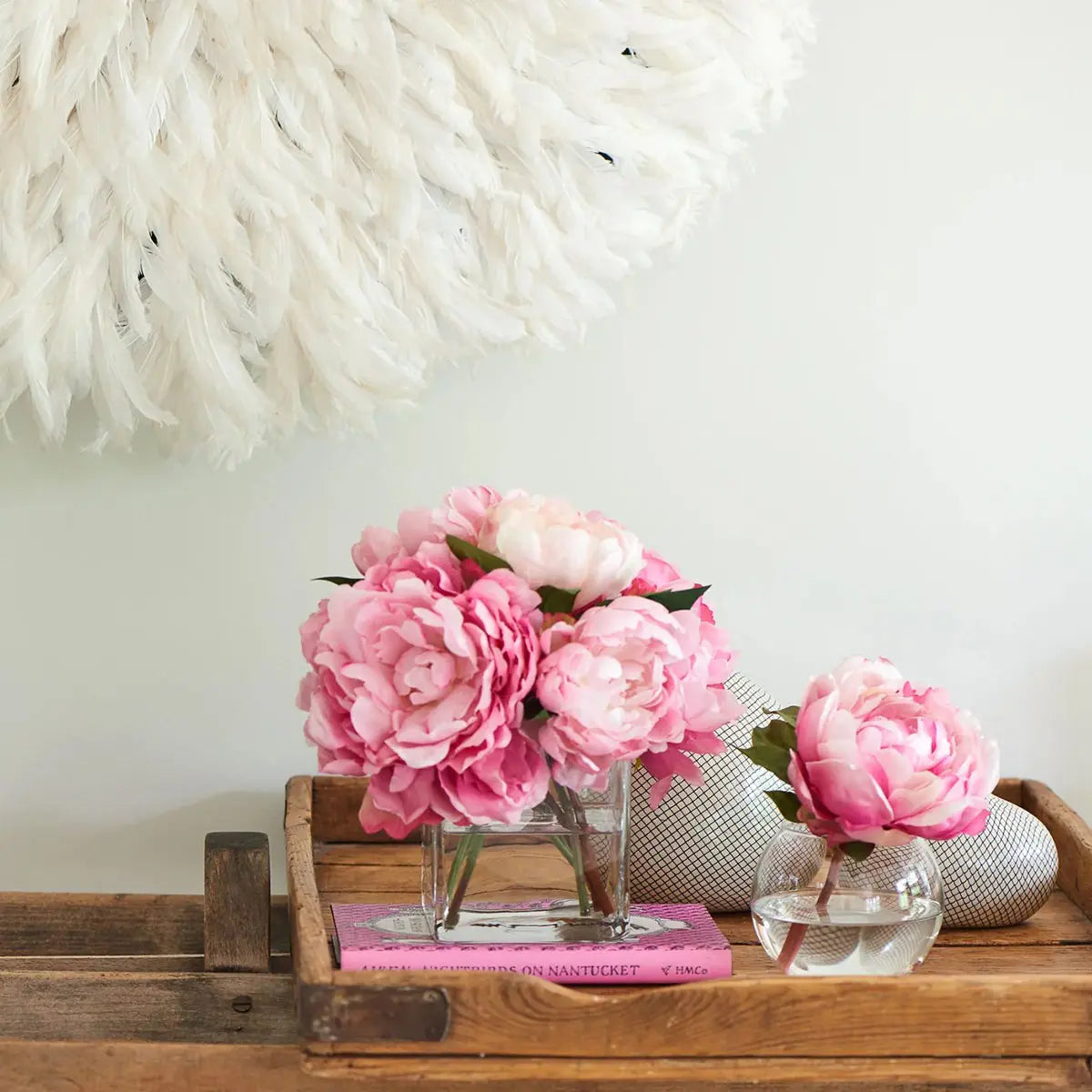 Diane James Pink Peonies in Glass Cube on a wood decorative tray and console table in a room