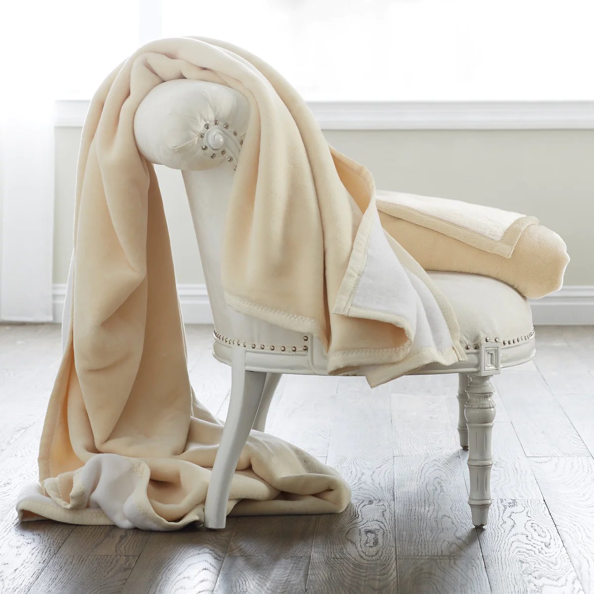 An image of Scandia White & Cream Reversible Cotton Blanket