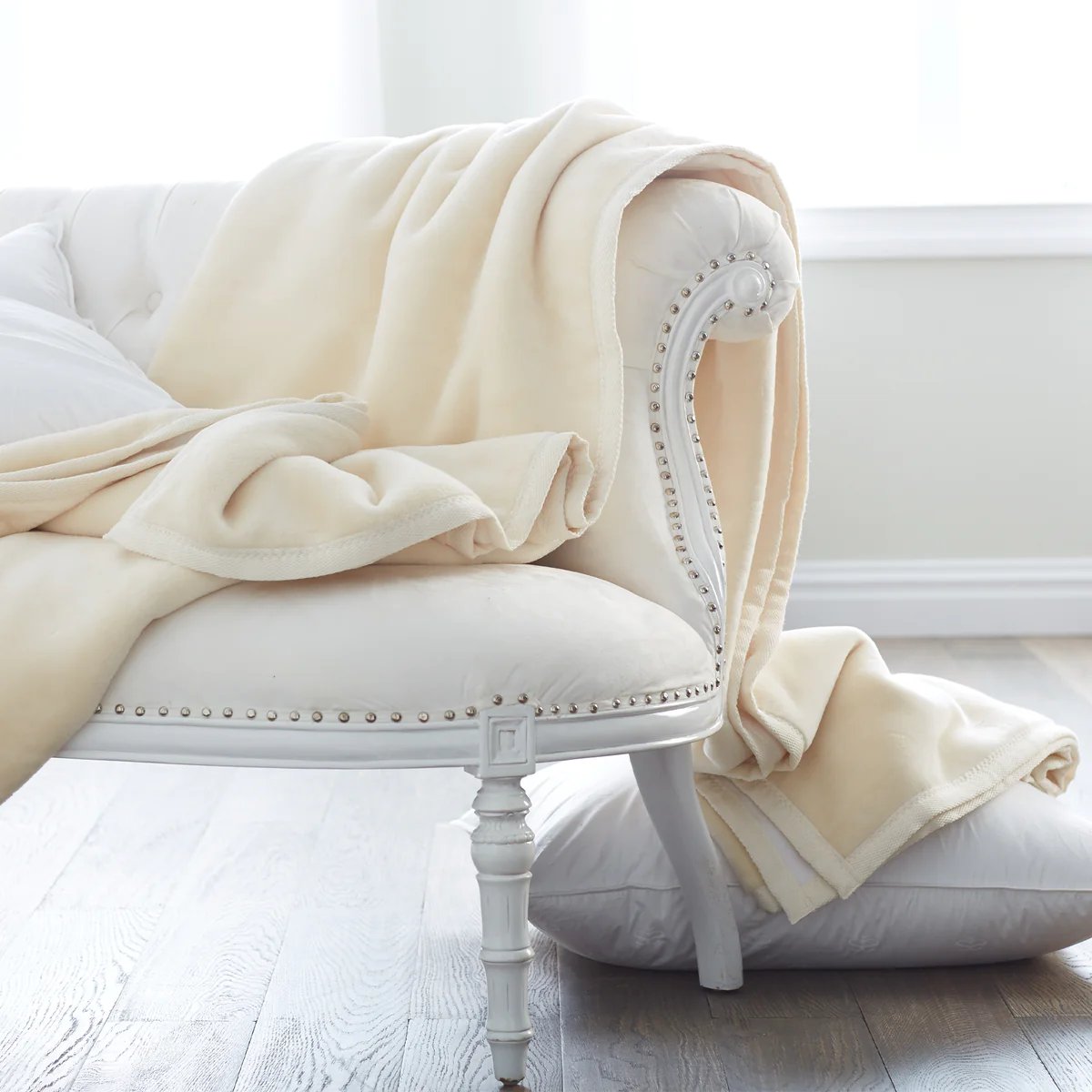 An image of Scandia White & Cream Reversible Cotton Blanket