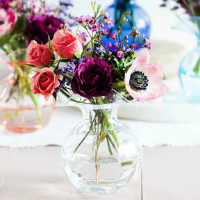 Vietri Hibiscus Clear Glass Bud Vase in a room