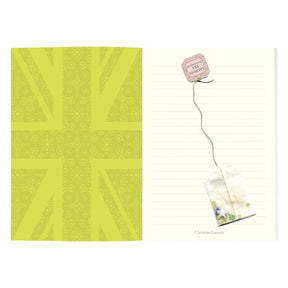 Inside of Hachette Christian Lacroix London A5 Notebook with a lacroix tea in london tea bag.