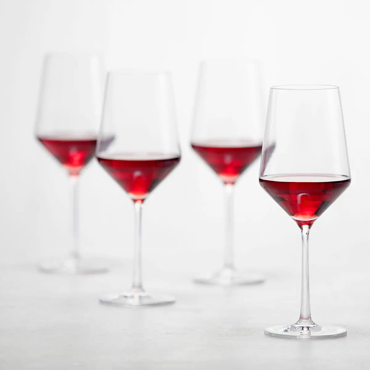 Four Filled Fortessa Pure Wine Glasses