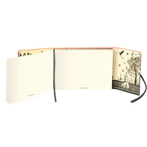 Fully open Hachette Christian Lacroix Bois Paradis Paseo Guest Book showing the front page