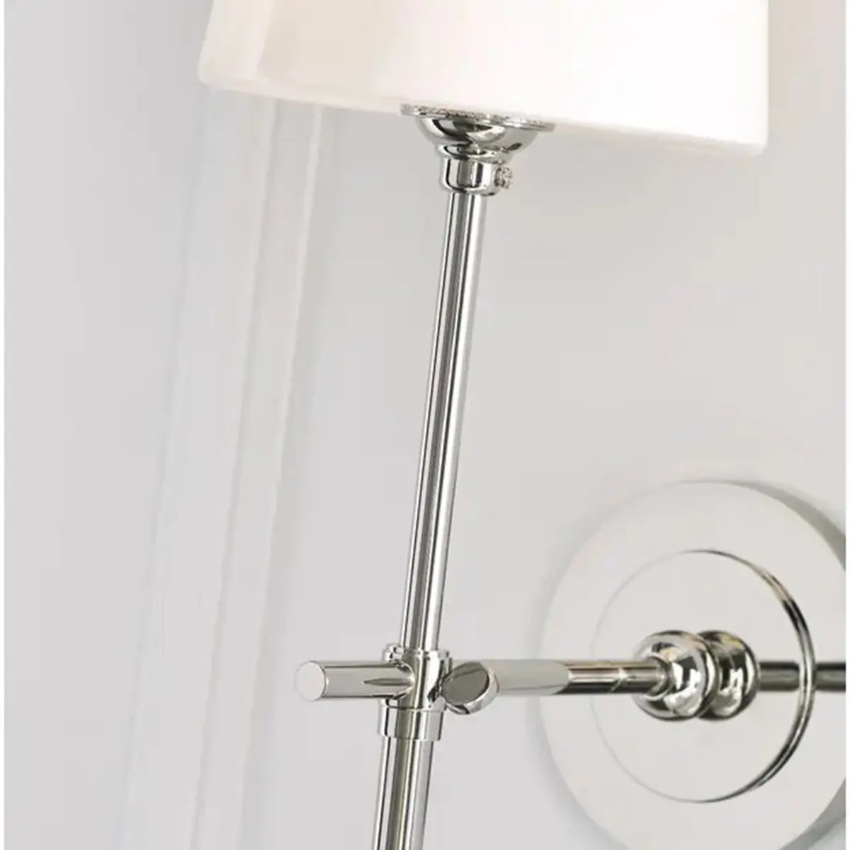 Close up of Visual Comfort Bryant Sconce in Polished Nickel and White