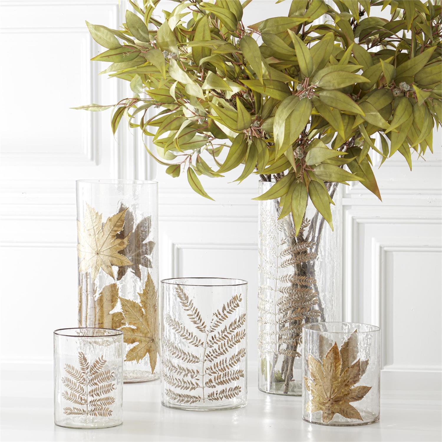 An image of K&K Clear Textured Glass Cylinders with Dried Leaves - Set of 3