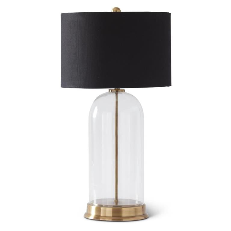 An image of K&K Interiors 29.5" Clear Glass Lamp w Gold Metal Spine and Black Shade