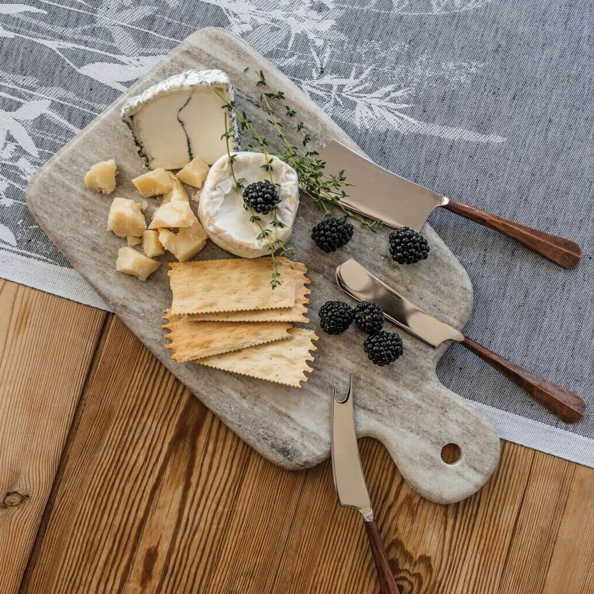 An image of Simon Pearce Woodbury Copper Cheese Knife Set in Gift Box