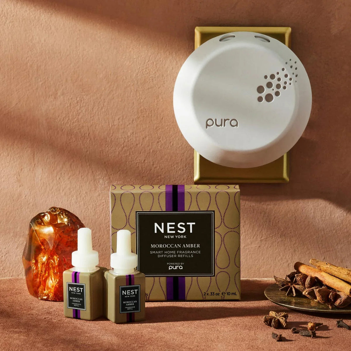 An image of Nest Fragrances Morrocan Amber Pura Smart Diffuser Refill Set