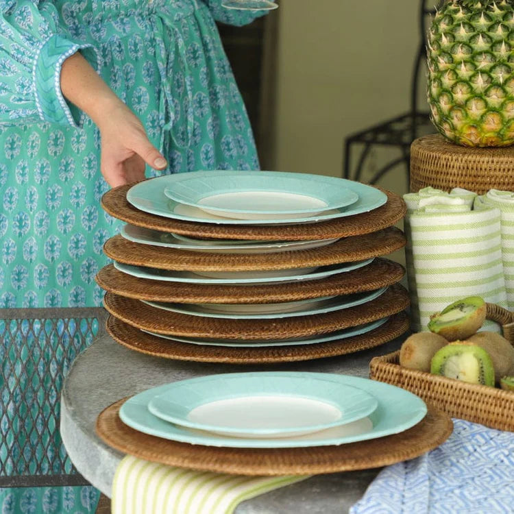 An image of Caspari Rattan Round Plate Charger - Dark Natural