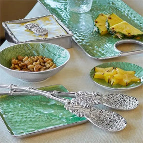 Mariposa Croc Small Square Green Plate in a room with food