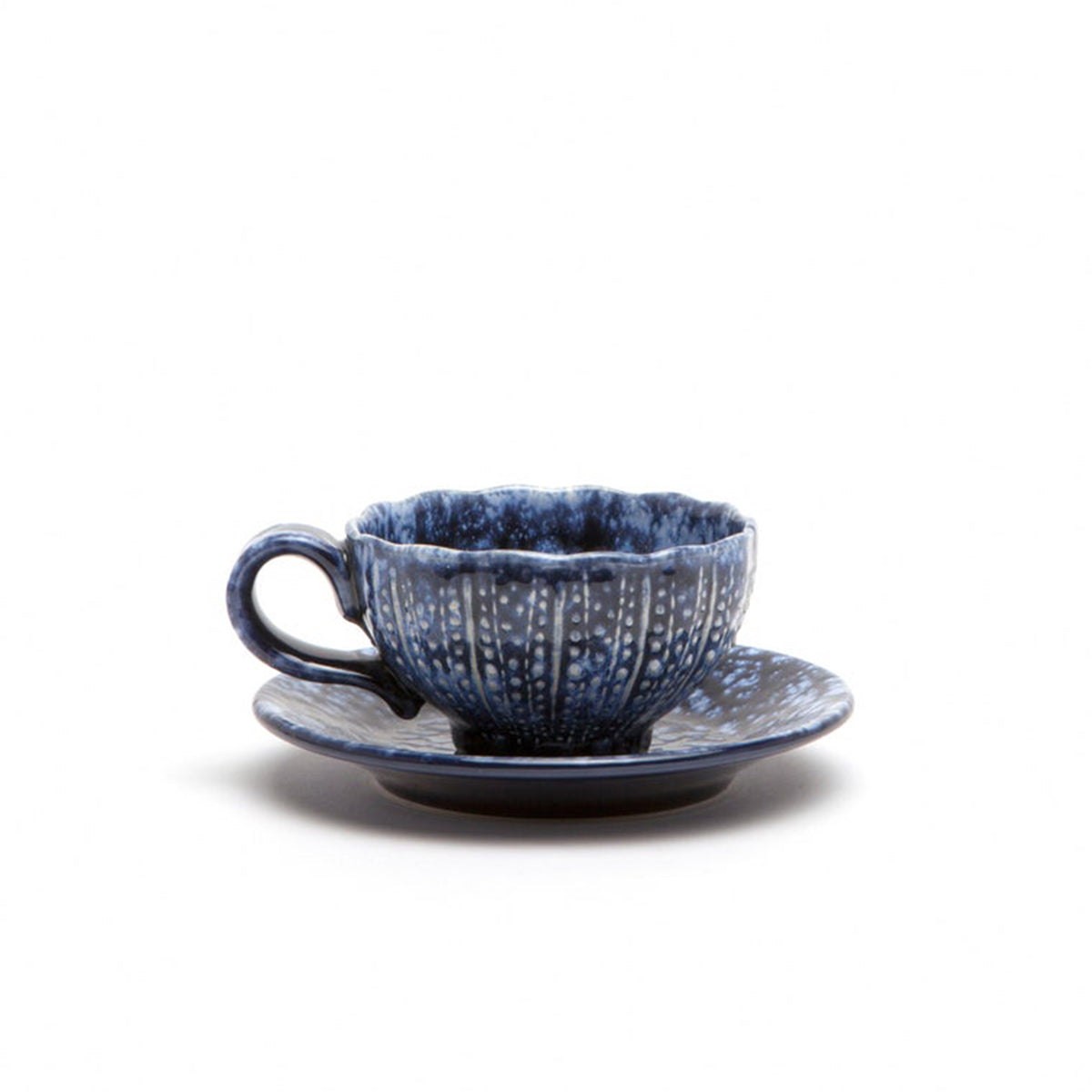 An image of Blue Pheasant Isla Spotted White Navy Cup and Saucer- Pack of 4