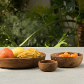 Blue Pheasant Anderson Serving Bowls with fruit outside with plants in the background