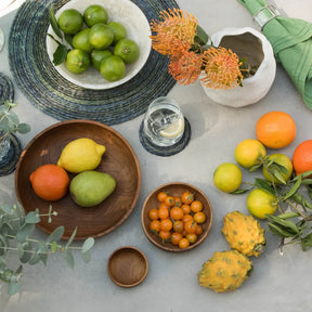 Blue Pheasant Anderson Serving Bowls with fruit and cherry tomatos on a set table