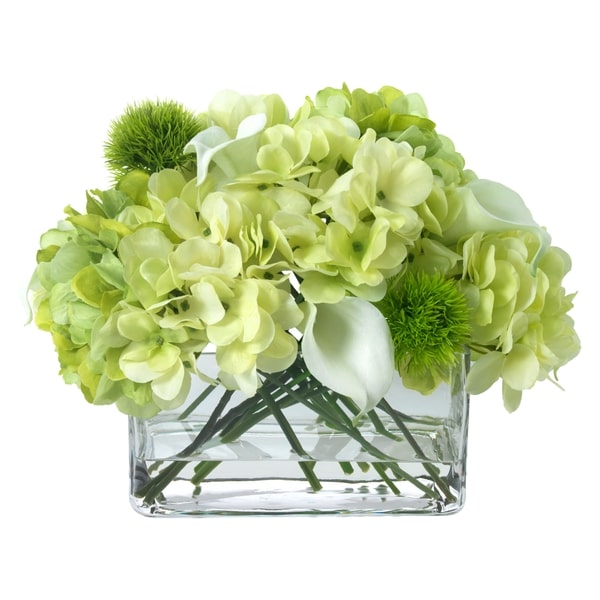 An image of Diane James BLOOMS Hydrangea and calla lily bouquet in glass rectangle
