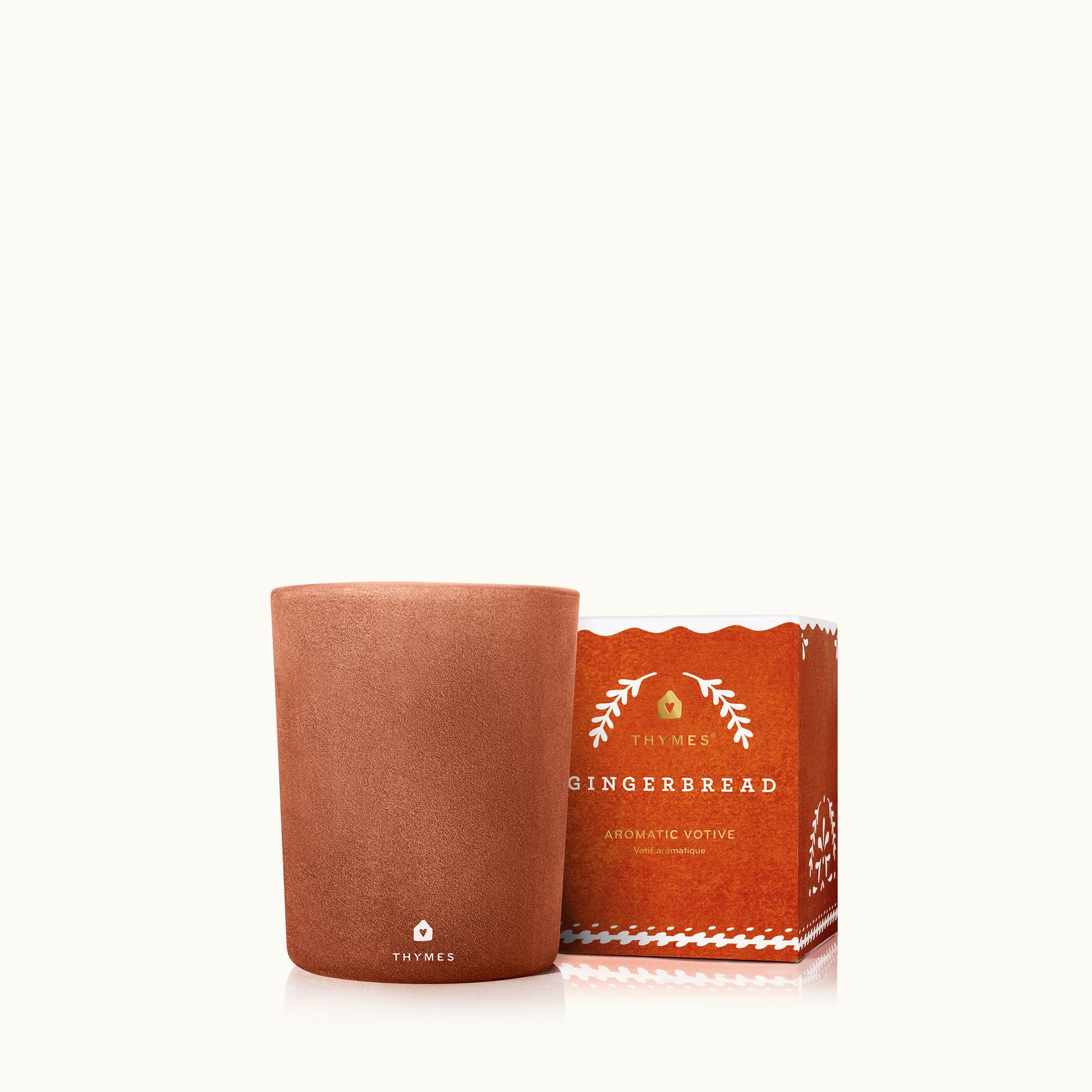 An image of Thymes Gingerbread Votive Candle 2 oz