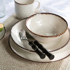 Blue Pheasant Montecito Dark Brown knife and fork by a pair of bowls on a table