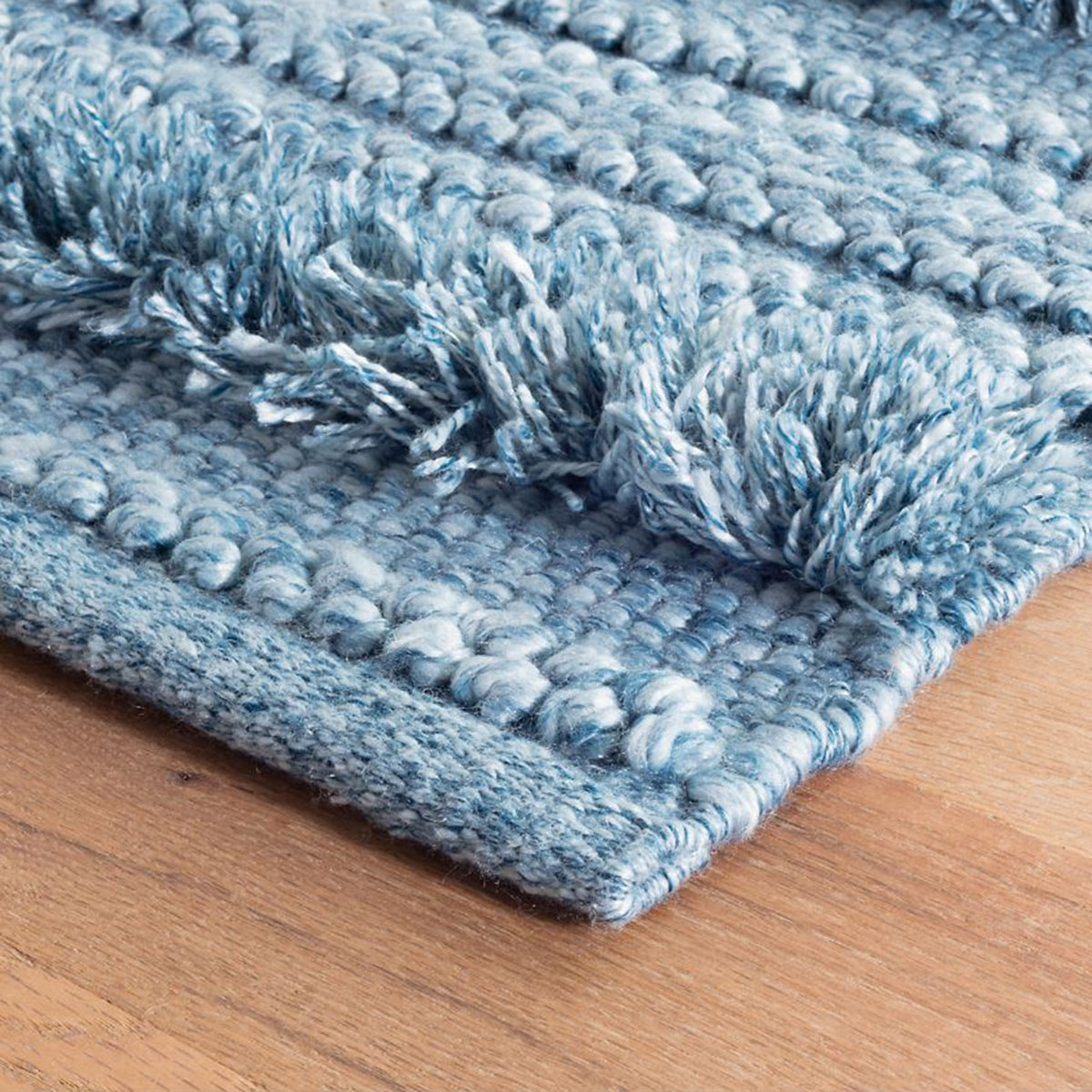 An image of Dash & Albert Zhara Stripe Denim Handwoven Rug - 5' x 8'