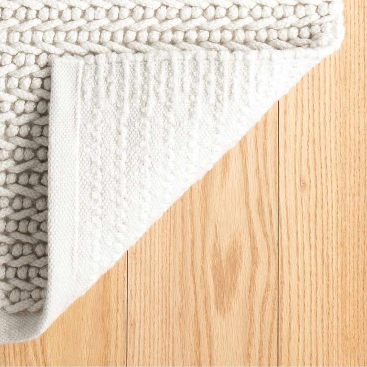 An image of Dash and Albert Veranda Ivory Handwoven Rug- 5'x 8'