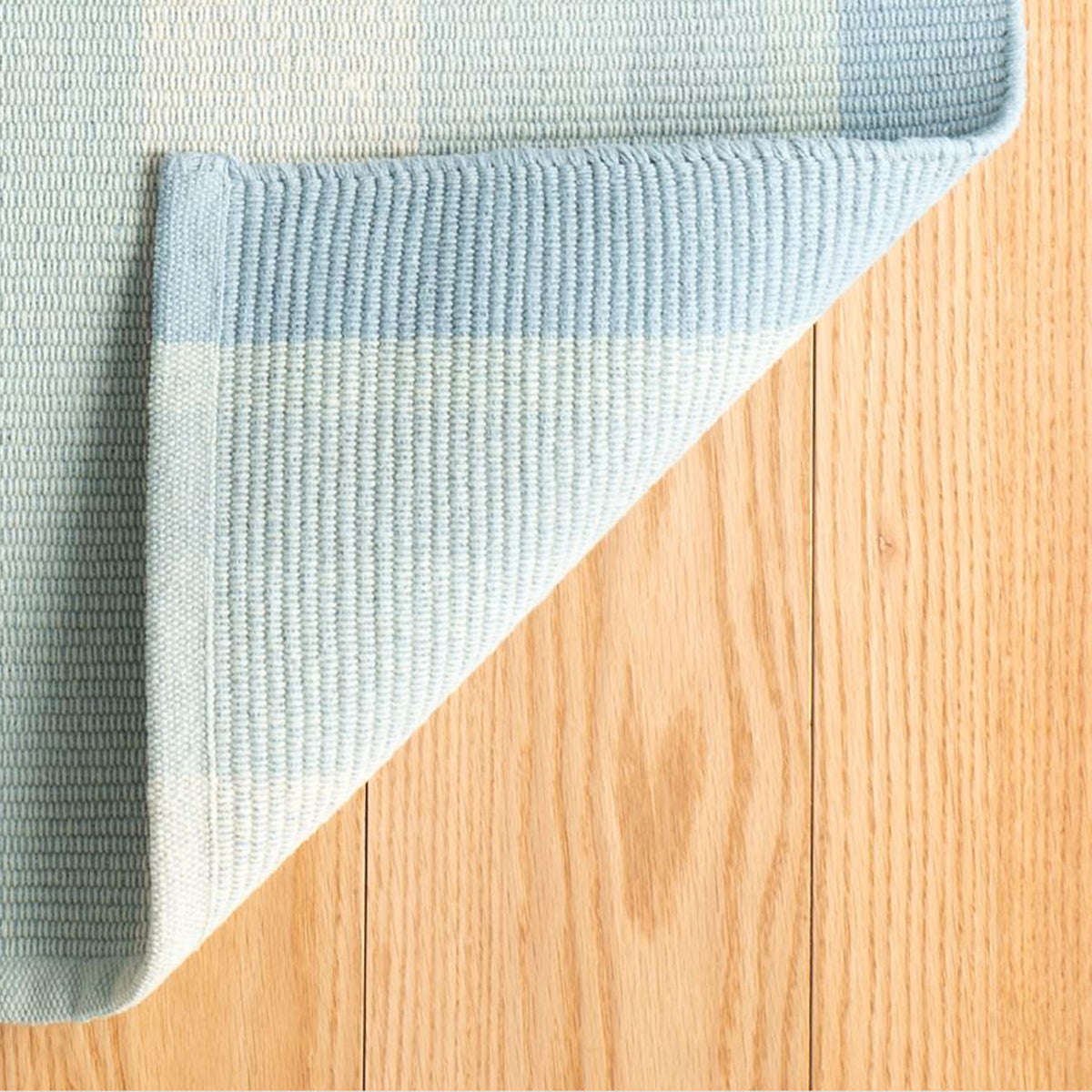 An image of Dash & Albert Shore Stripe Woven Cotton Rug