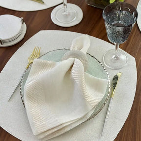 Bodrum Stingray Elliptic Placemat set on a dining table with tableware