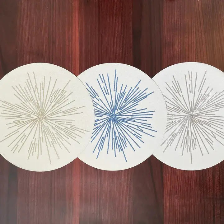 Bodrum Starburst Round Placemat Collection in three colors