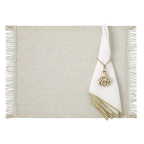 Mode Living Bel Air Metallic Dinner Napkin in Gold on a placemat with a napkin ring