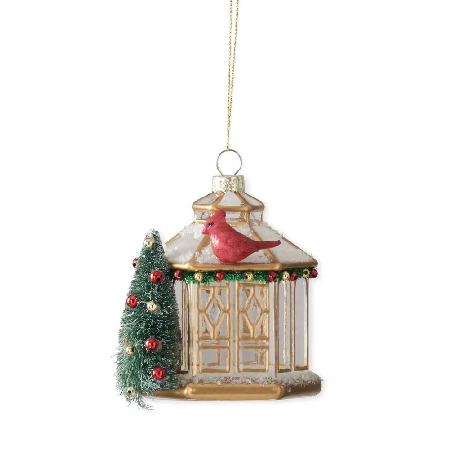 An image of K&K Interiors 4" Glass Gazebo with Bottle Brush Tree and Cardinal Ornament