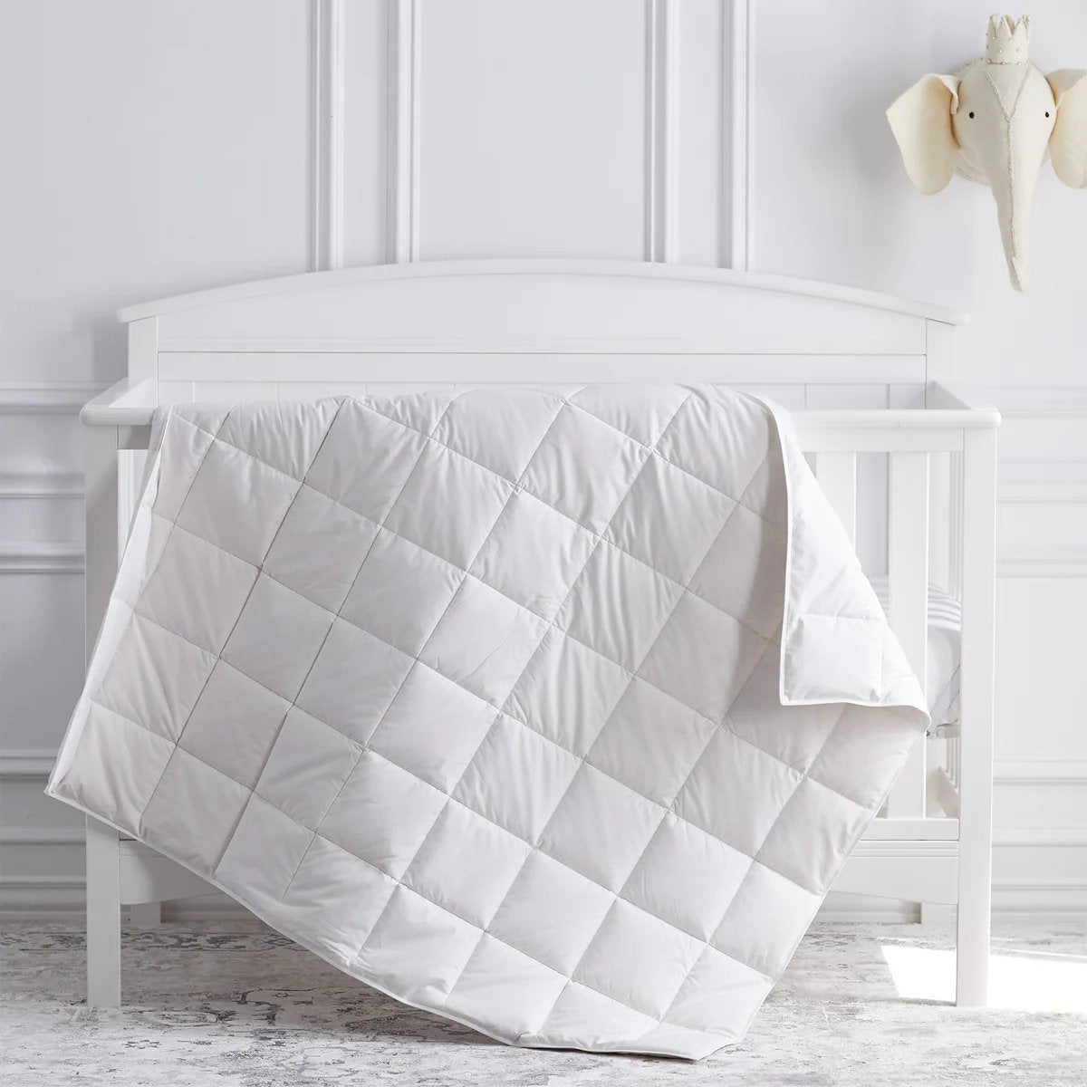 An image of Scandia Home Siesta Down Crib Blanket