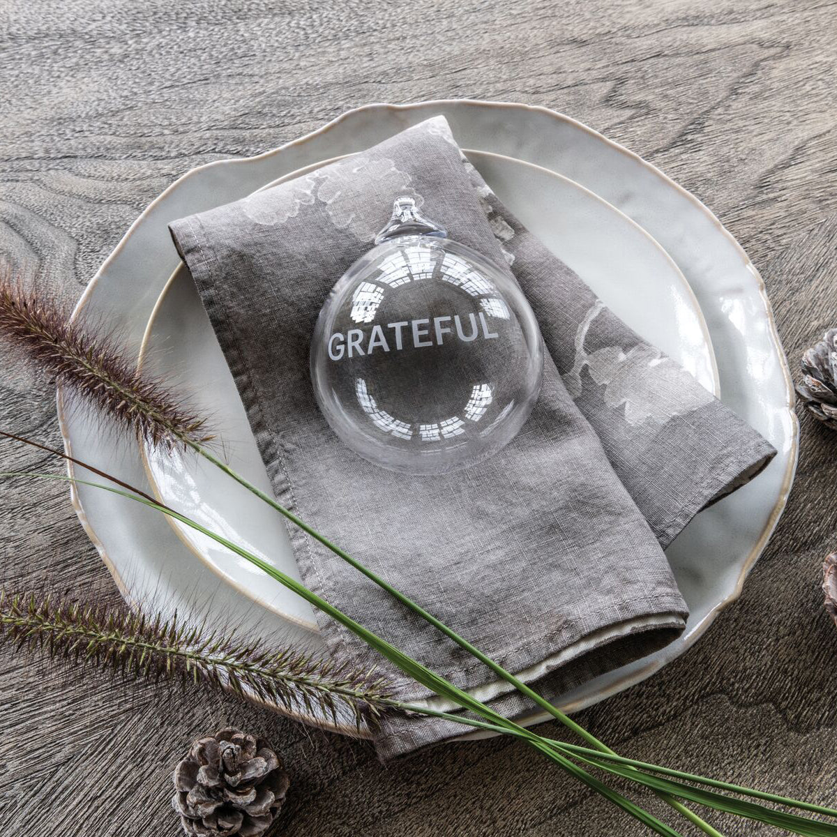 An image of Simon Pearce Engraved " Grateful" Ornament