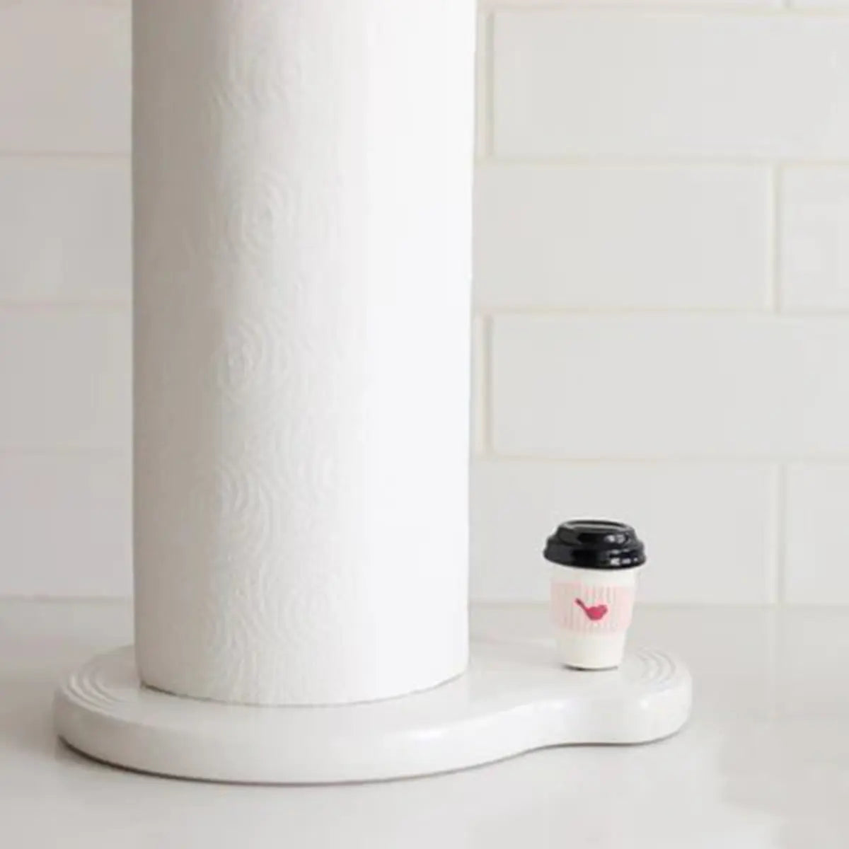 Nora Fleming Cup of Ambition Coffee Mini on a towel holder