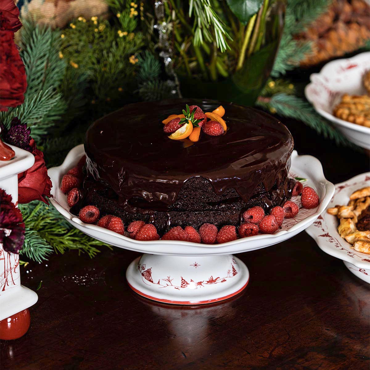 An image of Juliska Country Estate Winter Frolic Cake Stand - Ruby